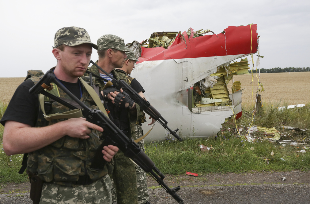 Pro-Russian separatists guarding the crash site. EPA/Anastasia Vlasova